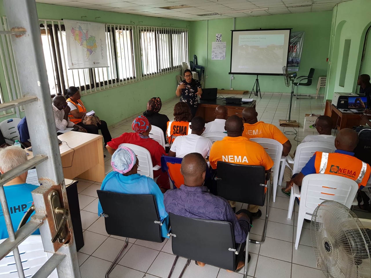 Senior Research Design Officer Nayana Das delivering a training at the emergency operation center of Kogi, Nigeria. ©UNDAC Team 2018