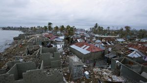 Homes lay in ruins after the passing of Hurricane Matthew in Les Cayes, Haiti, Thursday, Oct. 6, 2016. Two days after the storm rampaged across the country's remote southwestern peninsula, authorities and aid workers still lack a clear picture of what they fear is the country's biggest disaster in years. (AP Photo/Dieu Nalio Chery)