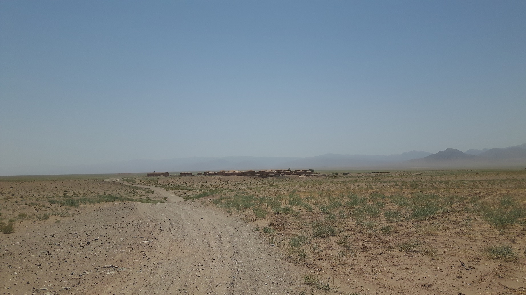 Small settlement seen from afar in the Western region of Afghanistan ©REACH/2018