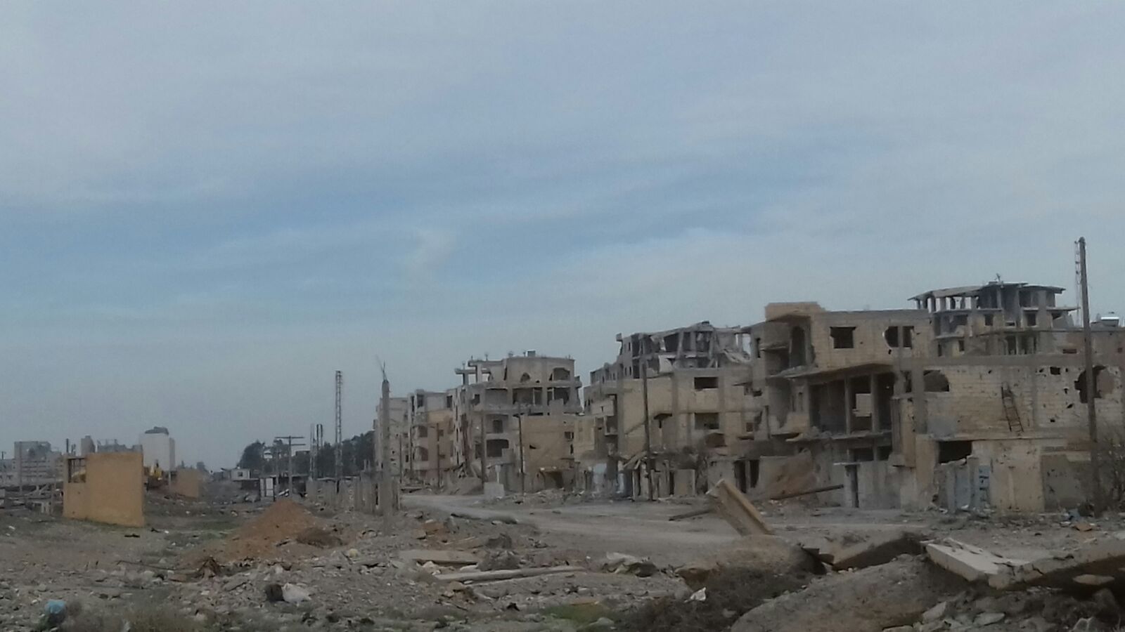 Destroyed residential buildings in Ar-Raqqa city. ©REACH/2018